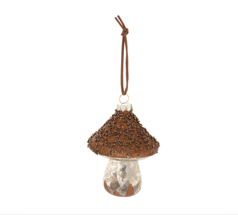 Decorative hanging ornament with textured top and clear base on a white background