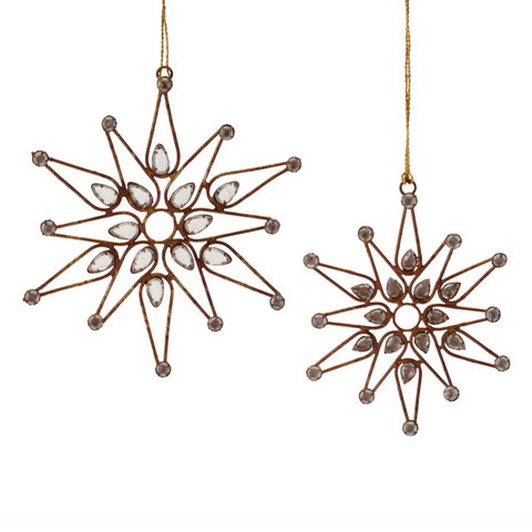 Two decorative star-shaped ornaments on a white background