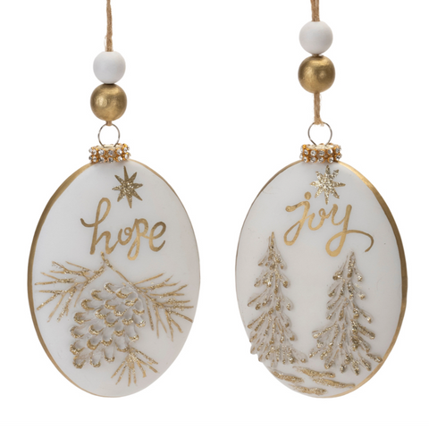 Two Christmas ornaments with 'hope' and 'joy' text on a white background