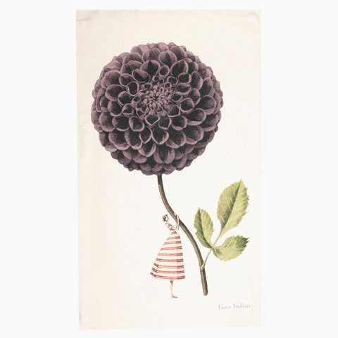 tea towel with the Illustration of a large purple flower with a small striped character on a beige background
