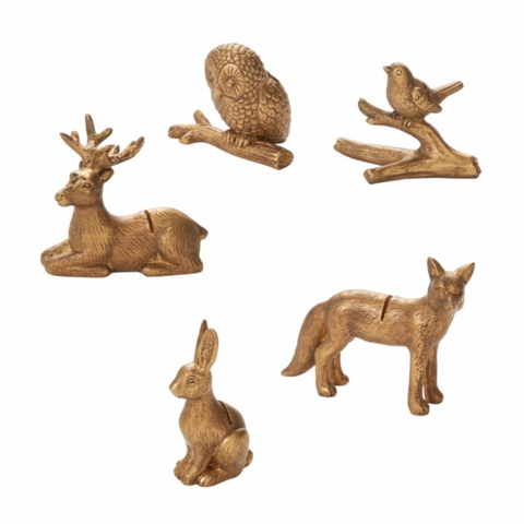 Set of five bronze animal figurines on a white background