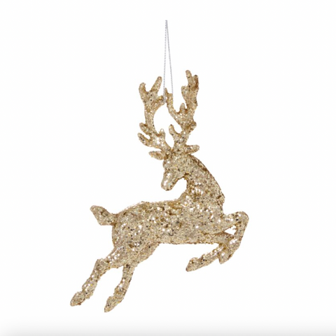 Gold glitter reindeer ornament on a white background