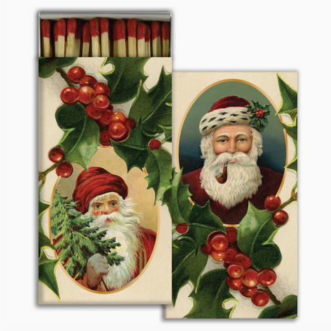 Matchbox with vintage-style Santa Claus illustration and holly design