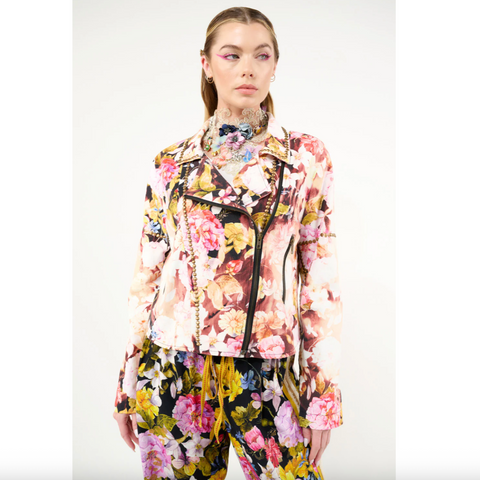 Woman wearing a floral outfit on a white background