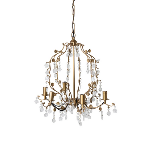 Gold chandelier with crystal accents on a white background