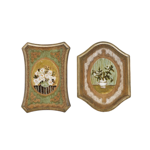 Two decorative wall art pieces with floral and botanical designs on a white background.