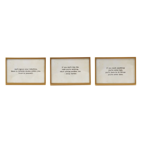Three framed quotes on a white background