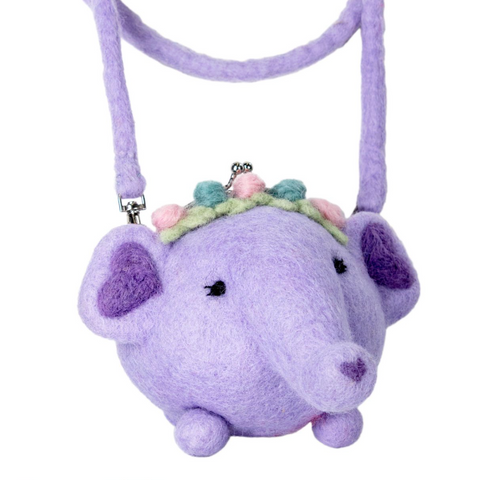 Purple plush elephant with a floral headband on a white background