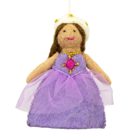 Toy fairy figure with a purple dress and crown on a white background